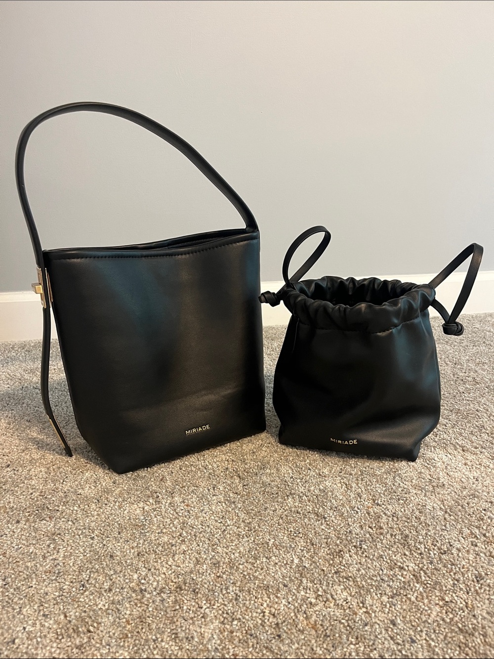Brand new! Never used!Muriade Black Leather shoulder purse with Drawstring Pouch
